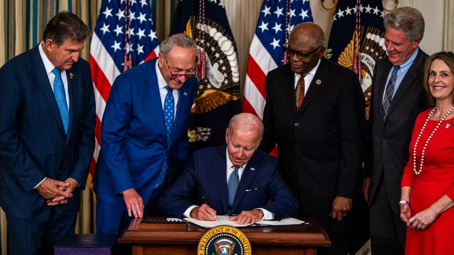 Biden signing the IRA