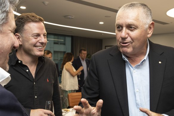 From left: Former Nine chief executive Mike Sneesby and broadcaster Ben Fordham speak to Ray Hadley at a lunch to celebrate his 20 years on 2GB mornings.