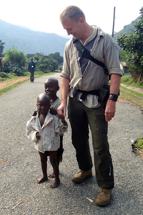 Andrew Turley with local children in the Rwenzori Mountains of Uganda.