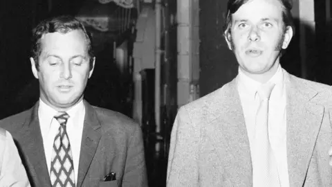 Getty Images Lloyds Bank on the corner of Baker Street and Marylebone Road, London. Our Picture Shows: Robert Rowlands (left) the radio ham operator, overheard conversations between the robbers and their rooftop lookout, 13th September 1971. (Photo by Illingworth/Mirrorpix/Getty Images)