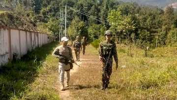 Security personnel patrol in a sensitive area of Manipur. Search operations and area domination were conducted by security forces in the fringe and vulnerable areas of hill and valley districts of the state. (PTI)