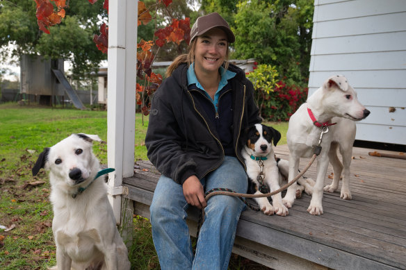 Season two contestant Lily with her dog Snow and some new pups. 