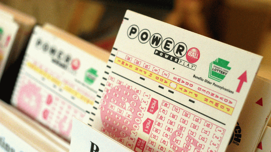 WASHINGTON CROSSING, PA - MAY 10: Powerball tickets await players at Cumberland Farms convenience store May 10, 2004 in Washington Crossing, Pennsylvania. The winner of the May 8th $213 million dollar Powerball jackpot has yet to come forward. For selling the winning ticket, the Cumberland Farms store will receive $400,000. (Photo by William Thomas Cain/Getty Images)