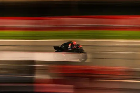 Alejandro Garcia/EPA-EFE French MotoGP rider Fabio Quartararo rides his motorbike on track