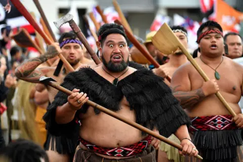 SANKA VIDANAGAMA/AFP Members of the Maori community take part in a protest rally in Wellington 