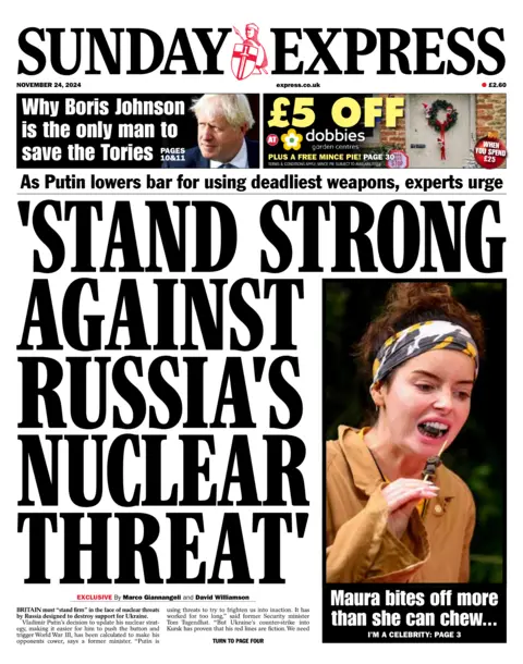 The Sunday Express headline: "STAND STRONG AGAINST RUSSIA'S NUCLEAR THREAT"