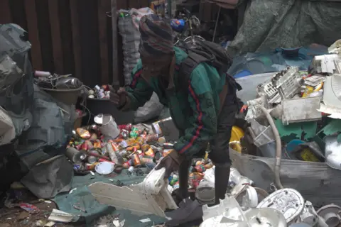 A worker at the Agbogbloshie scrapyard.