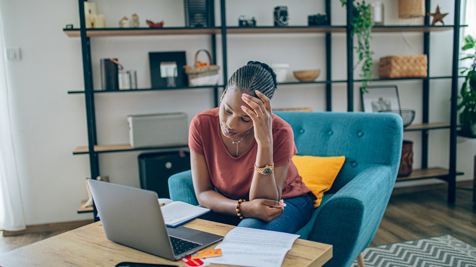 A woman in financial stress