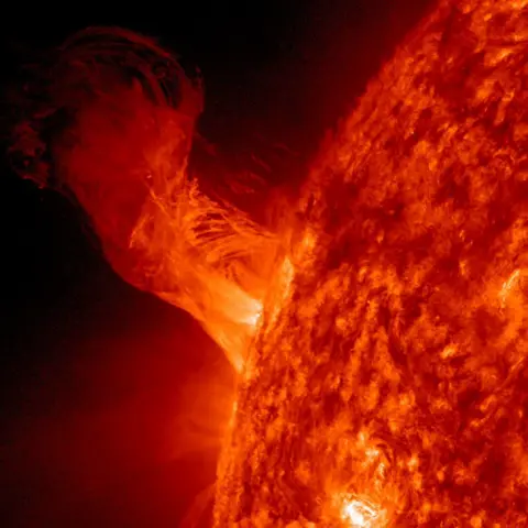 Getty Images IN SPACE - DECEMBER 31: In this handout from NASA, a solar eruption rises above the surface of the sun December 31, 2012 in space. According to NASA the relatively minor eruption extended 160,000 miles out from the Sun and was about 20 times the diameter of Earth. (Photo by NASA/SDO via Getty Images)