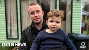 Family live in mobile home after mortgage rejected