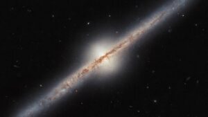 Hubble Space Telescope Captures Rare Edge-On View of a Spiral Galaxy Located Millions of Light-Years Away