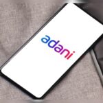 Adani Group entities see negative rating actions from Fitch post bribery charges