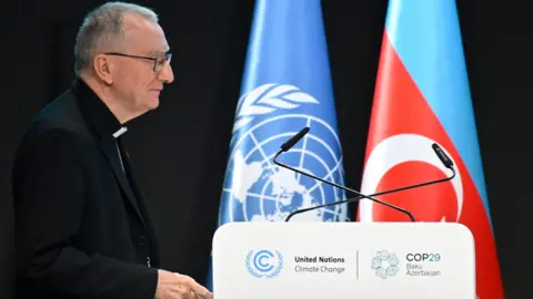 Alexander Nemenov/AFP/ Getty Images Vatican's Secretary of State Pietro Parolin gives a speech during the United Nations Climate Change Conference (COP29) in Baku