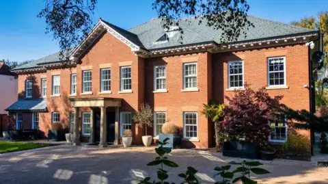 Berkeley Shaw Exterior shot of Jurgen Klopp's former Merseyside mansion on a sunny day