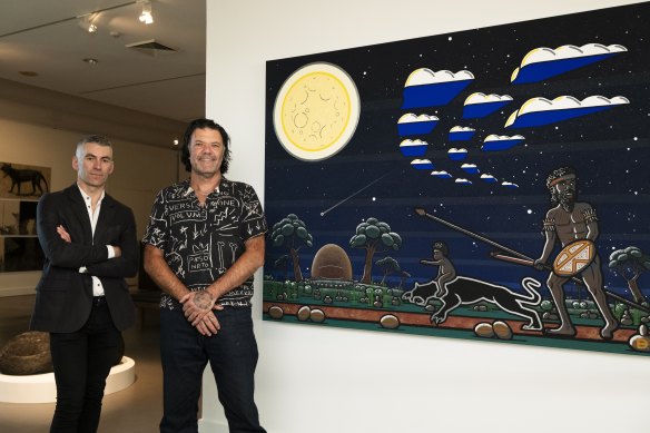 Toby Chapman and artist Blak Douglas with the work he provided for the exhibition.