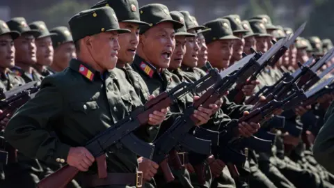 Getty Images KPA soldiers march during a mass rally on Kim Il Sung square in Pyongyang on September 9, 2018