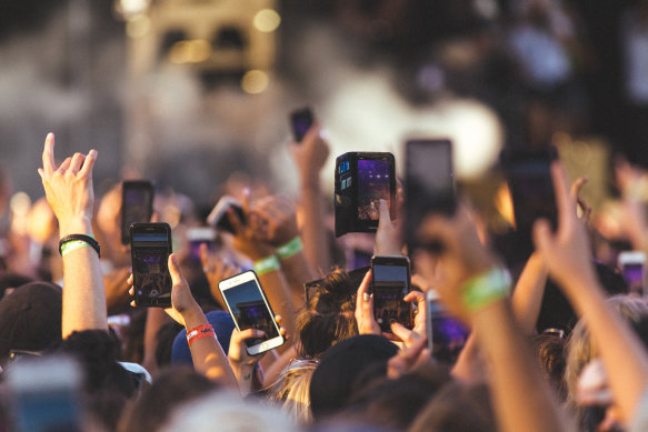 Phones have become an unwelcome mainstay at many concerts. 