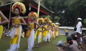 Young girls in Bali dance at post-harvest festival, prove traditions are not dying