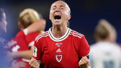 Getty Natasha Harding celebrates a goal during a Wales match