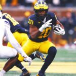 Michigan beats Northwestern 50-6 to become bowl eligible