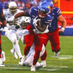 Kansas beats No. 16 Colorado 37-21 as Buffs’ Big 12 title hopes take hit