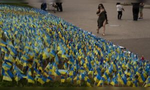 Ukraine’s Independence Square turns into a memorial of blue and yellow flags as war reaches 1,000 days