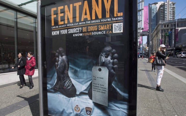 A message on a bus shelter warns about the dangers of fentanyl.