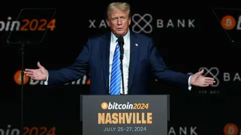 Reuters Republican presidential nominee and former U.S. President Donald Trump gestures at the Bitcoin 2024 event in Nashville, Tennessee, U.S., July 27, 2024.