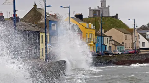 Getty Images Waves crashing over the promenade at Donaghadee Co Down Northern Ireland