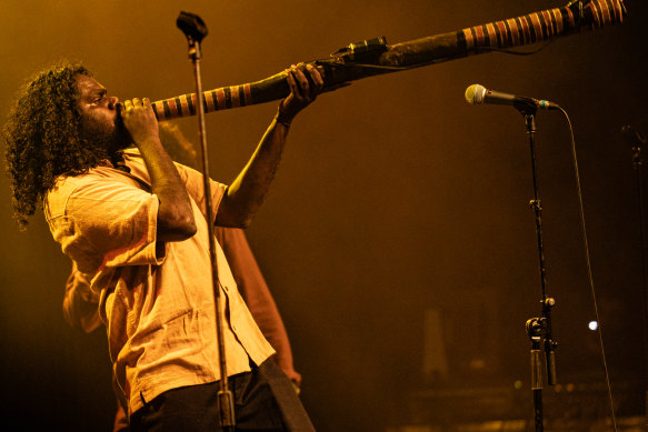 Yimila Gurruwiwi of King Stingray plays the didgeridoo during a gig at the Enmore Theatre in 2023. 