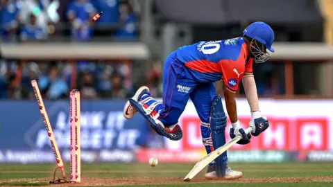 Getty Images Delhi Capitals' Prithvi Shaw is clean bowled by Mumbai Indians' Jasprit Bumrah during the Indian Premier League (IPL) Twenty20 cricket match between Mumbai Indians and Delhi Capitals at the Wankhede Stadium in Mumbai on April 7, 2024.