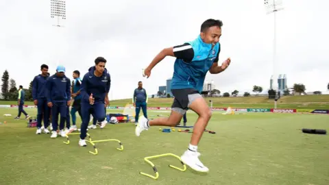 Getty Images : Captain Prithvi Shaw of India warms up during the ICC U19 Cricket World Cup match between India and Papua New Guinea at Bay Oval on January 16, 2018 in Tauranga, New Zealand.