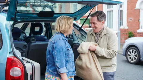 BBC/Toffee International Ltd/Tom Jackson Joanna Page and Rob Brydon pictured on set at Trinity Street in Barry.