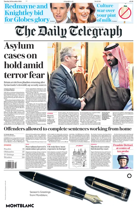 The headline in the Telegraph reads: "Asylum cases on hold amid terror fear". 