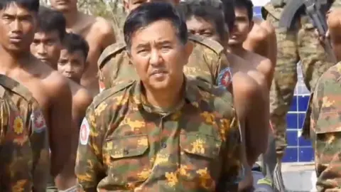 Arakan Army Brigadier-General Thurein Tun (centre) in the Arakan Army footage