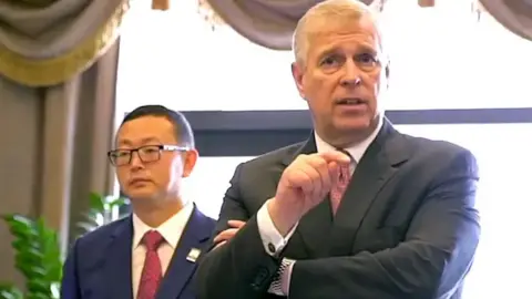 Supplied Mr Yang seen here with Prince Andrew