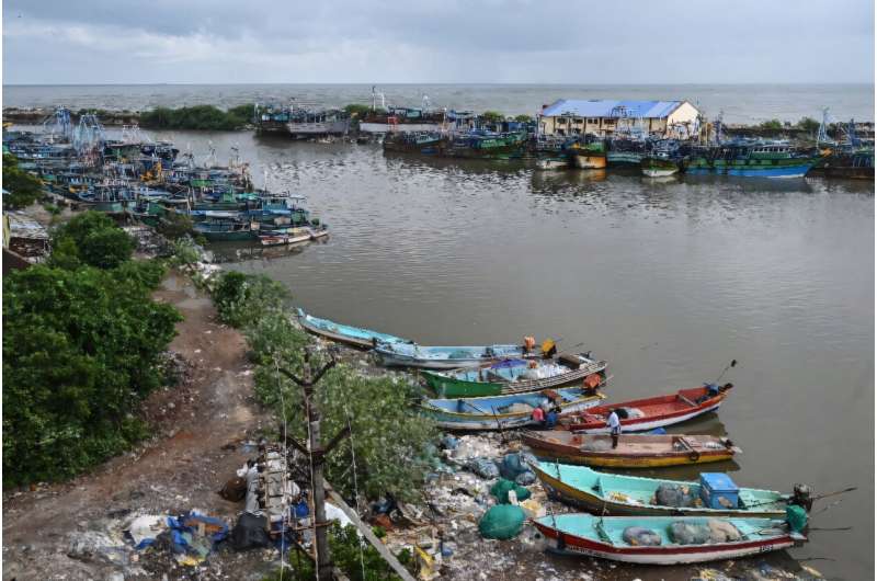 Fishing boats are moored along the backwaters of Akkaraipettai, a village on the coast of India's Tamil Nadu state that was swamped by the deadly 2004 tsunami