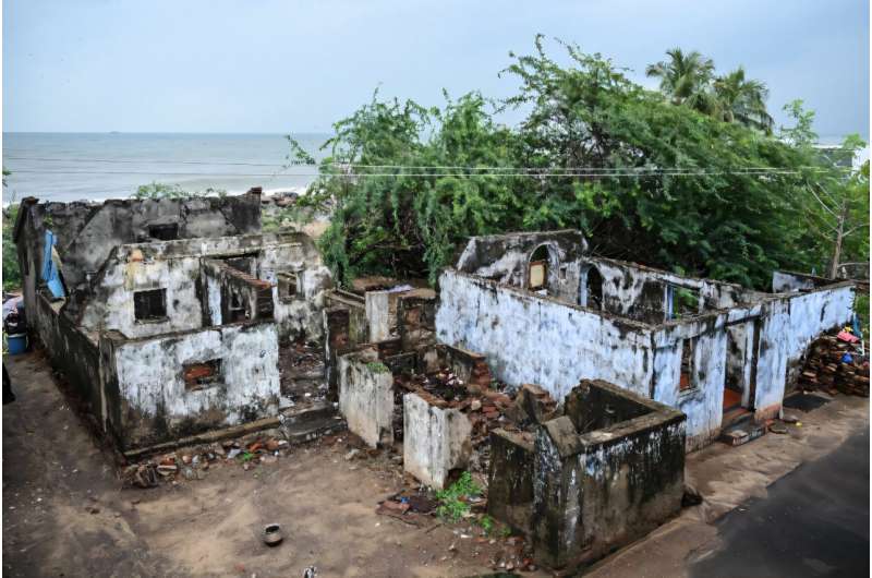 Houses destroyed by the 2004 tsunami still lie abandoned in Akkaraipettai village in India's Tamil Nadu state