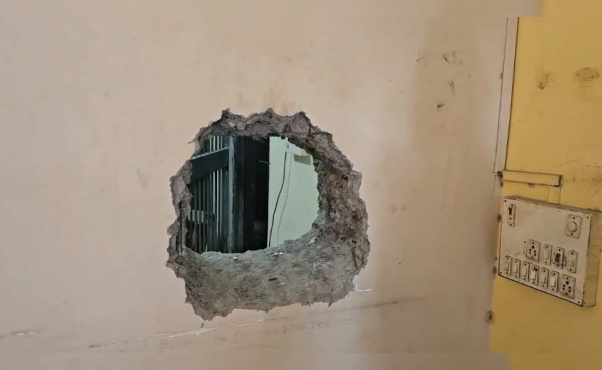 The thieves entered the locker room by making a two-foot hole in a wall.