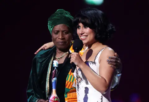 Reuters Raye and her grandmother at the Brit Awards