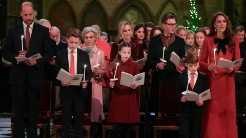 Reuters William, Prince of Wales, Prince George, Princess Charlotte, Prince Louis, and Catherine, Princess of Wales, attend the Together At Christmas carol service at Westminster Abbey in London, Britain, December 6, 2024