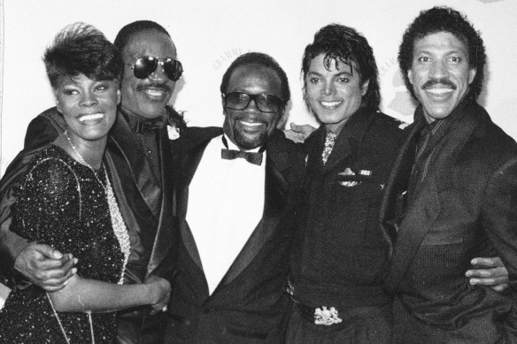 Warwick (left) with Stevie Wonder, Quincy Jones, Michael Jackson and Lionel Richie at the 1986 Grammy Awards.