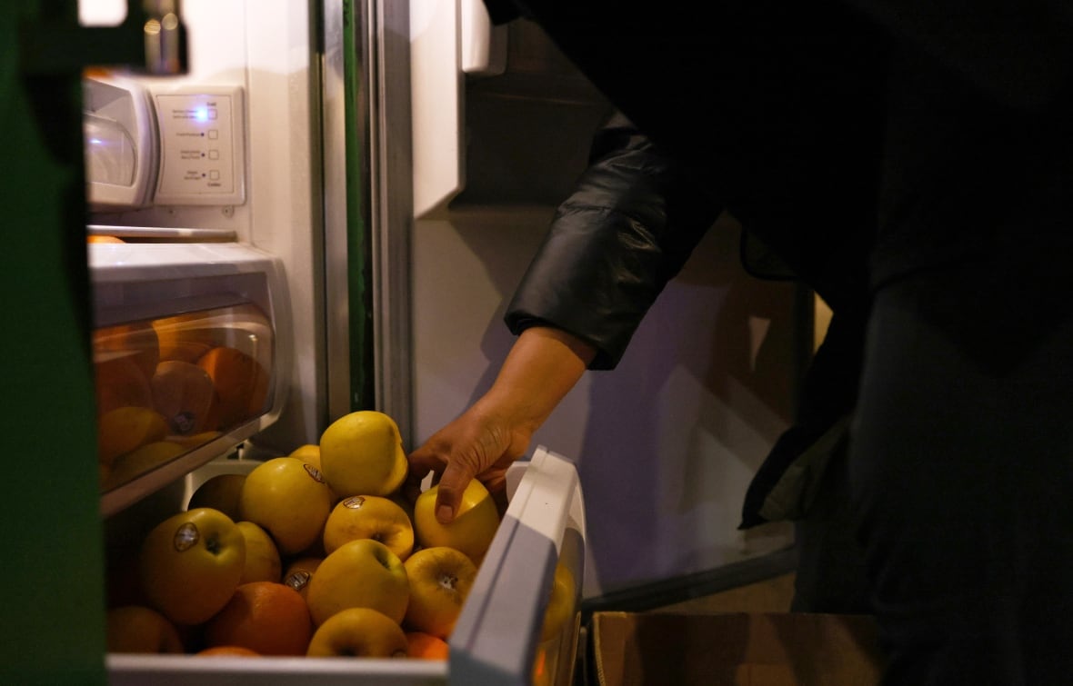 Apples in a refrigerator bin.