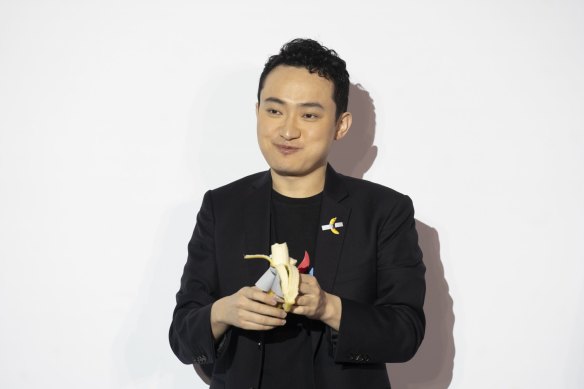 Crypto founder Justin Sun eats the organic part of Maurizio Cattelan’s Comedian, in Hong Kong after paying $9.6 million for it.