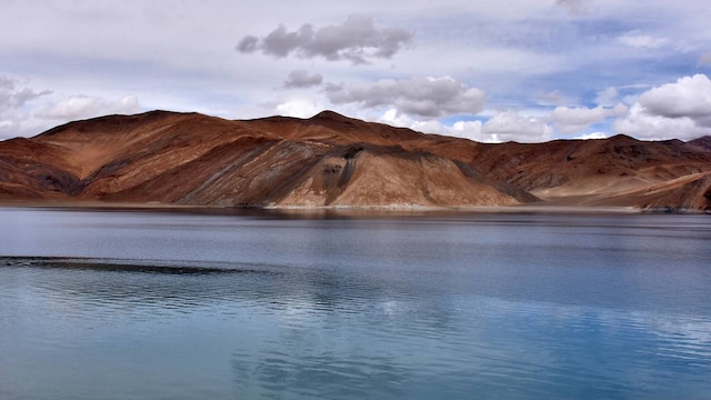 No 10.  Leh to Pangong Lake | Winter brings out the beauty of Pangong Lake, with its ice-covered waters and snow-capped mountains. A drive here is perfect for solitude and spectacular views. Embark on these unforgettable road trips this New Year and enjoy the scenic charm of India’s diverse landscapes. (Image: Reuters)