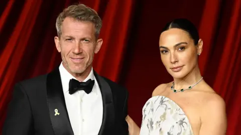 Getty Images Gadot with Jaron Varsano in formal dress at the Fourth Annual Academy Museum Gala at Academy Museum of Motion Pictures on October 19, 2024 in Los Angeles