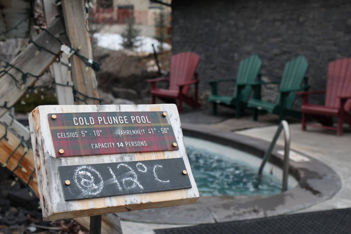 A sign indicating the 12 C temperature of a cold plunge pool is pictured at the Kananaskis Nordic Spa in Alberta.