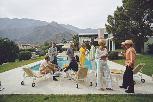 No, not creepy at all: Slim Aarons’ Desert House Party (1970).