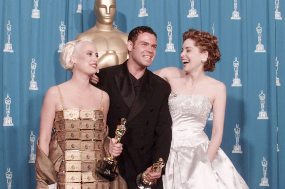 Celebrating with Sharon Stone: Lizzy Gardiner and Tim Chappel on the night they won their Oscars.