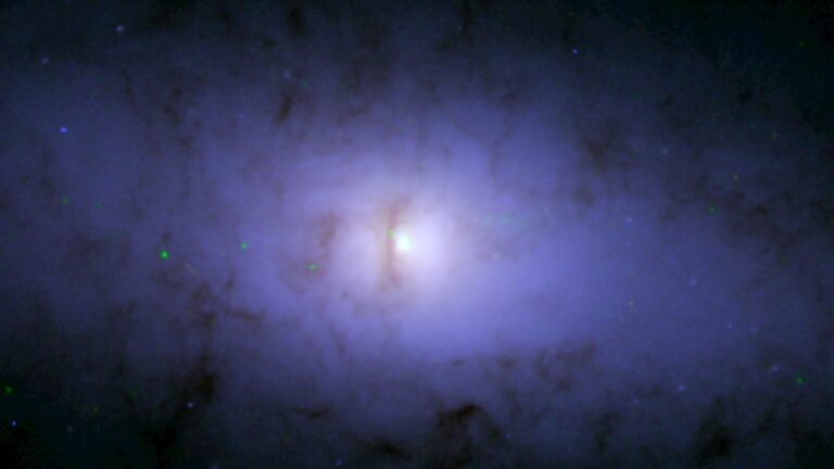 Hubble and Chandra Telescopes Spot Strange Tilted Black Hole in Galaxy NGC 5084